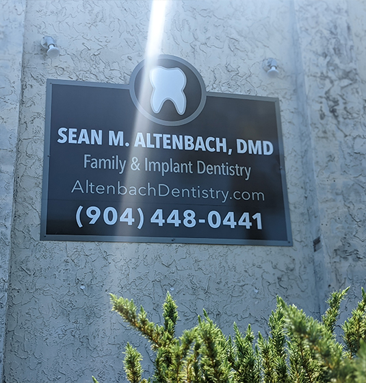 Sign that reads Sean M Altenbach D M D Family and Implant Dentistry