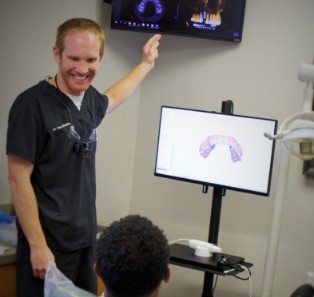 Jacksonville dentist showing a patient their dental x rays
