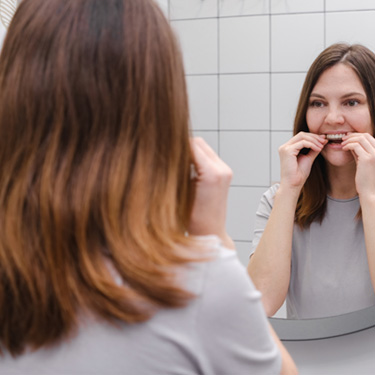 Remove your Altenbach clear aligners each time you eat or drink anything besides water