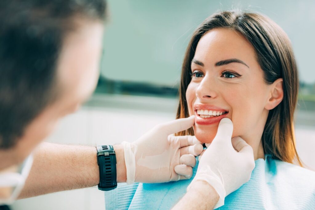 A woman getting a smile makeover at the dentist